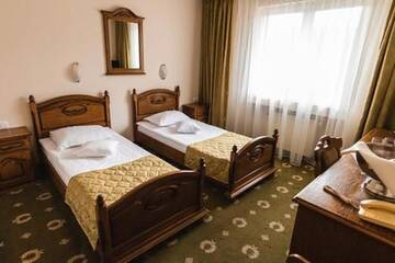 Фото номера Двухместный номер с 2 отдельными кроватями Отель Hotel Brilliant Meses г. Залэу 5