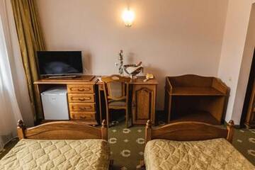 Фото номера Двухместный номер с 2 отдельными кроватями Отель Hotel Brilliant Meses г. Залэу 6